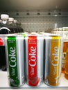 A can of diet coke in Ginger lime, Zesty Blood Orange, Twisted Mango flavor at supermarkets refrigerator.